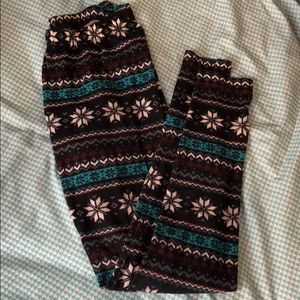 Red, blue, black and white colored pattern pants
